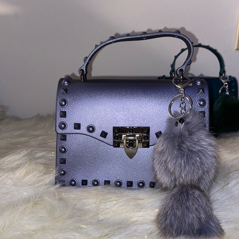 Comes with keychain and strap